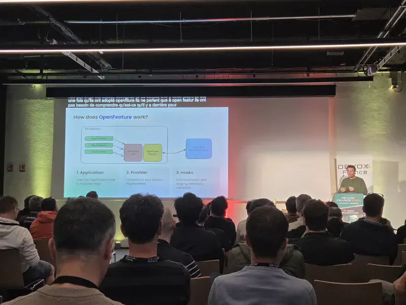Photo de la conférence Bye bye Vendor Lock-in : Standardisez vos Feature Flags avec OpenFeature